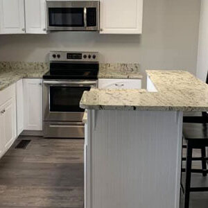 Affordable Construction remodels a kitchen with new countertop and island